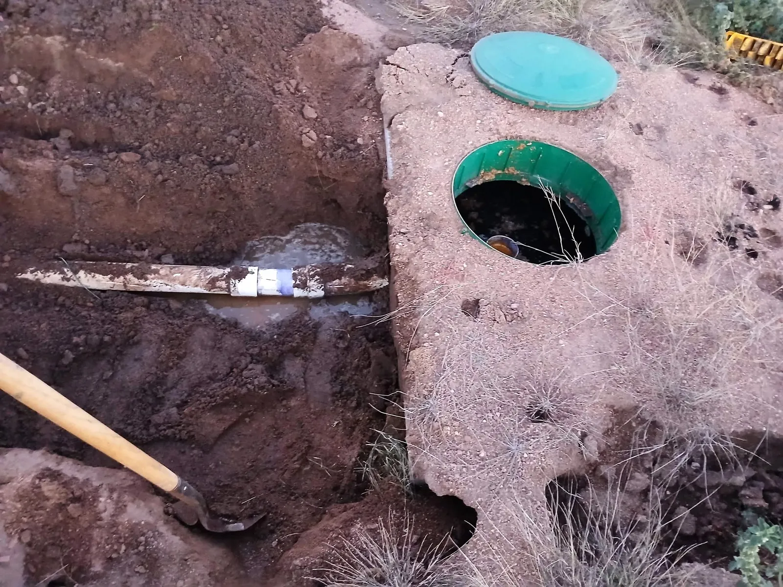 Septic line repaired at the tank, trench open