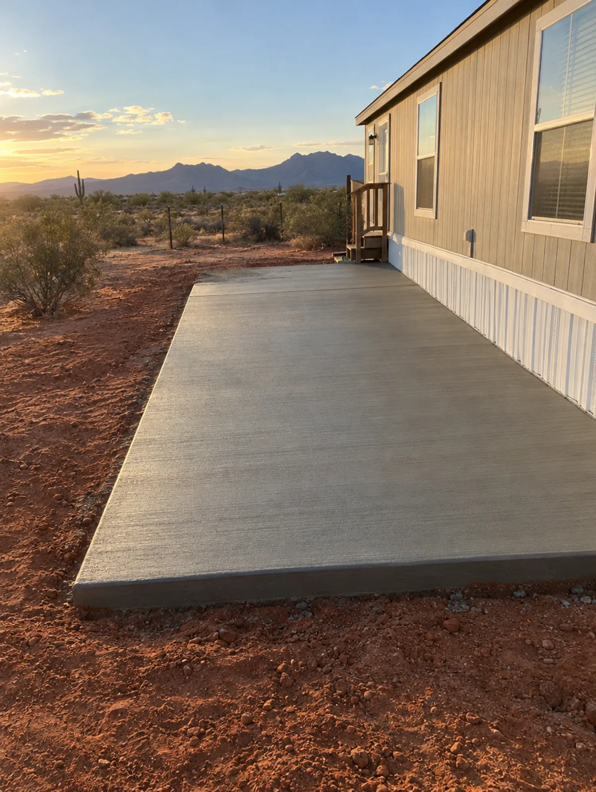 Illustration: a new concrete pad beside a home
